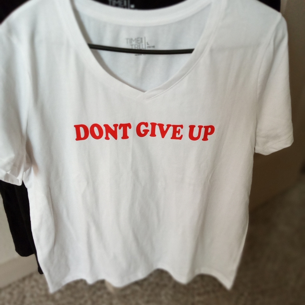 Brand new white t-shirt with red letters